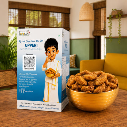A box of Foremost Foods Kerala sharkara varatti Upperi crackers sits on a wooden table next to a gold bowl filled with the golden-brown crackers, set in a cozy, modern living room.