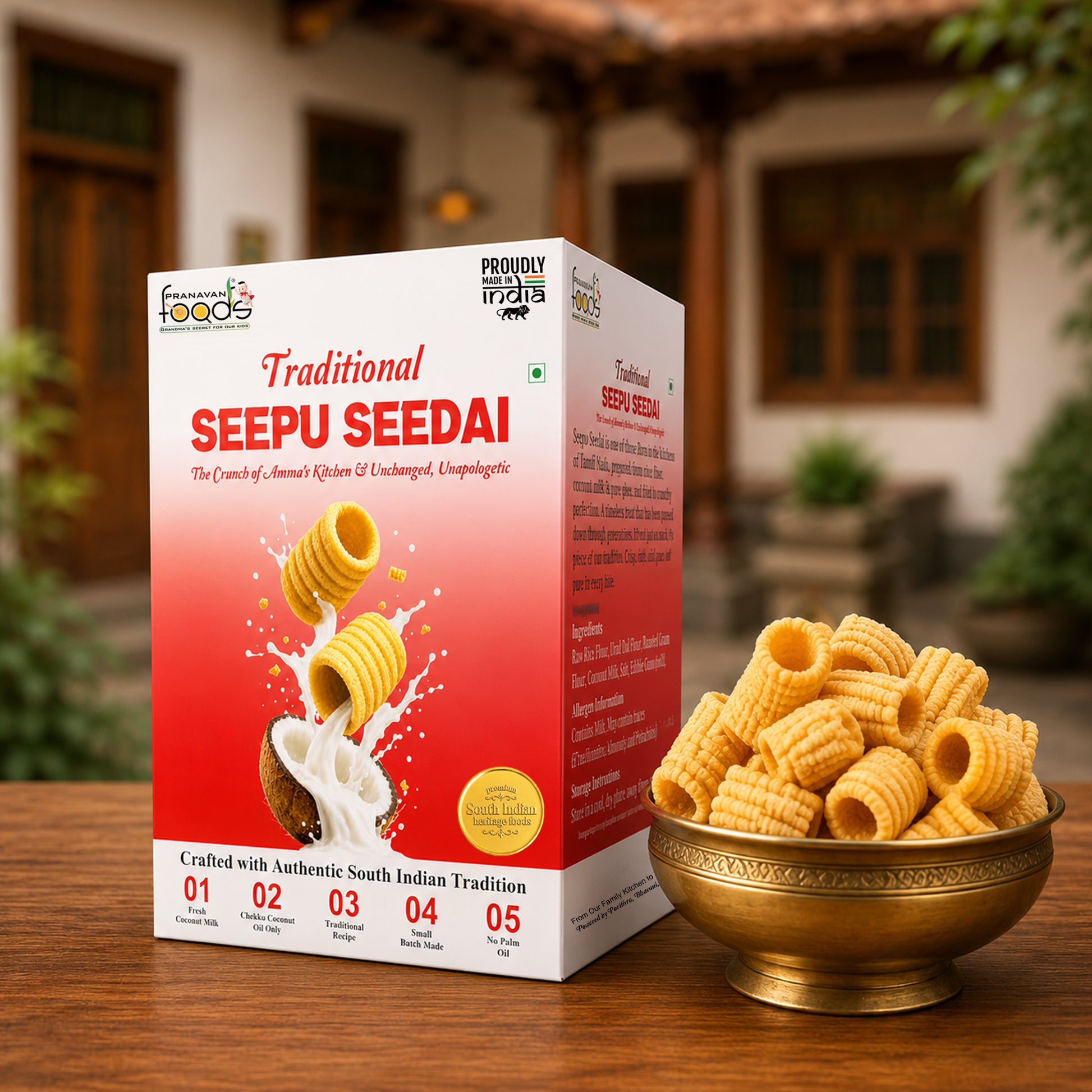 A box of Traditional Seepu Seedai snack crackers stands on a wooden table outdoors, with a brass bowl of the golden-yellow rolled crackers placed beside it. The packaging is predominantly white and red with product imagery and text, and the background shows a softly blurred traditional building and greenery.