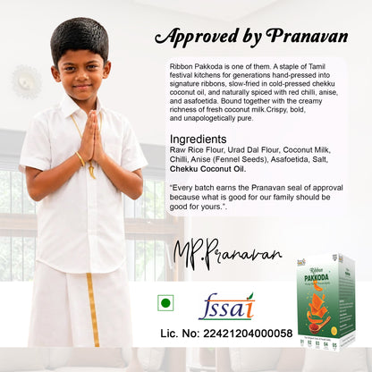 A child in a white kurta and trousers stands with hands together in prayer pose next to product information text for Pranavan foods ribbon pakkoda. The image includes ingredients, an 'Approved by Pranavan' seal, an Mp.Pranavan