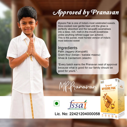 A promotional graphic for Mysore Pak Karupatti sweets featuring a young boy in a white traditional outfit with a gold stripe, standing in front of a blurred background. The image includes text about the product, an 'Approved by Pranavan' seal, an ingredients list, the MP.Pranavan logo, and a product box on the bottom right.