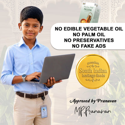 A young boy in a light blue shirt and khaki pants holds a laptop while standing in front of a decorative light gray background. A product box labeled Palkova is visible at the top right, along with large text stating 'NO EDIBLE VEGETABLE OIL NO PALM OIL NO PRESERVATIVES NO FAKE ADS' and a gold seal reading 'South Indian heritage foods'.