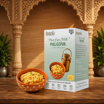 A box of Pranavan Foods Pure Cow Milk Palkova next to a bowl of the prepared food, displayed on a wooden table with an ornate archway background.